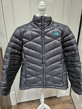 North Face Women's Black Puffer Jacket with Teal Logo and Inside